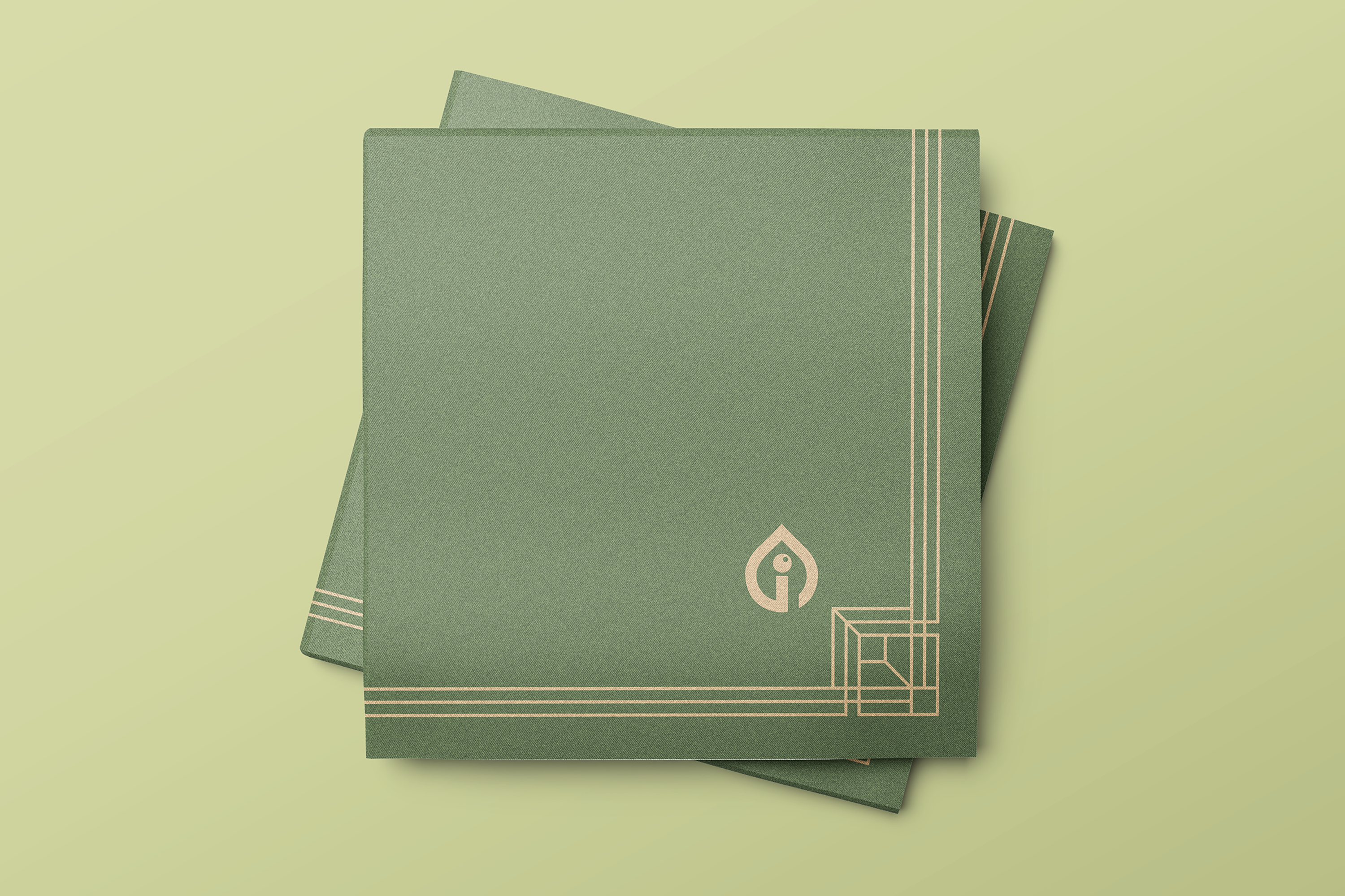 Inkgility branded cocktail napkins mockup: paper napkins printed with the brand mark and wordmark for event use